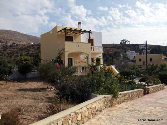 villa with garden space around it